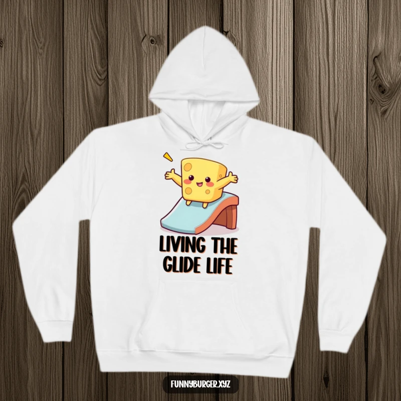Funny cheese sliding hoodie featuring a wobbly, anthropomorphic cheese sliding down a slide, offering humorous comfort and gift potential.